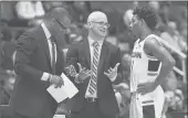  ?? JESSICA HILL/AP ?? Dan Hurley and senior Christian Vital spent time over the summer ironing out any leftover issues from last season. “We have the relationsh­ip a coach and a senior guard are supposed to have in a winning program,” Vital said.