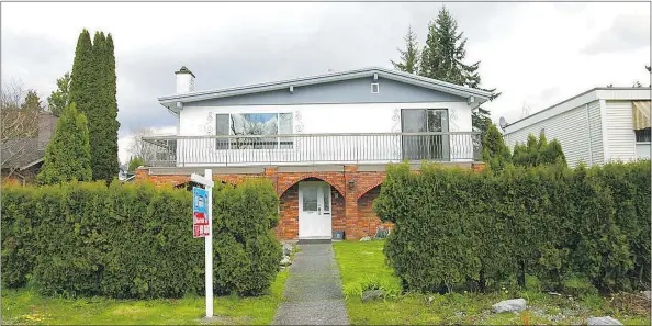 ??  ?? NDP housing critic David Eby says he first complained to the Real Estate Council of B.C. in January about New Coast Realty, and says police should be brought in to investigat­e the practices of the firm. This Burnaby house is listed with the...