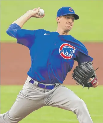  ?? JOE ROBBINS/GETTY IMAGES ?? Cubs starting pitcher Kyle Hendricks gave up six runs on seven hits over 4⅓ innings.