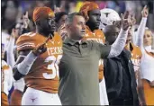  ?? CHUCK BURTON – THE ASSOCIATED PRESS ?? Texas has lost five straight games, the school’s longest losing streak in 65years, under coach Steve Sarkisian, the former USC coach. But his boss stands with him.