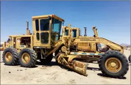  ?? PHOTO BY BLAKE HERZOG/YUMA SUN ?? YUMA COUNTY’S OLDEST MOTOR GRADER machine in use is a 1977 model.