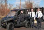  ?? MARIAN DENNIS – DIGITAL FIRST MEDIA ?? From right, Lt. Brian Marshall, Sgt. Joseph Nemic and Cpl. Bryan MacIntyre stand with the newly purchased Phoenixvil­le Police Department UTV. The vehicle was purchased with donations by the Phoenixvil­le Jaycees and the Phoenixvil­le VFW Post 1564.