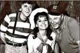  ?? (AP Photo/File) ?? In this 1965 photo, Dawn Wells, center, poses with fellow cast members of “Gilligan’s Island” Bob Denver and Alan Hale Jr., in Los Angeles. Wells, who played the wholesome Mary Ann, died early Wednesday in Los Angeles of causes related to COVID-19.