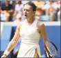  ?? Elsa / Getty Images ?? Simona Halep reacts during her U.S. Open women’s singles first-round match against Kaia Kanepi on Monday.