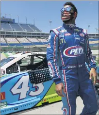  ?? MARK HUMPHREY — THE ASSOCIATED PRESS ?? Bubba Wallace waits for the start of Sunday’s NASCAR
Cup Series race at Kentucky Speedway. He can be part of Wednesday’s All-star race by winning a stage in the open race earlier Wednesday or getting the most votes from fans.