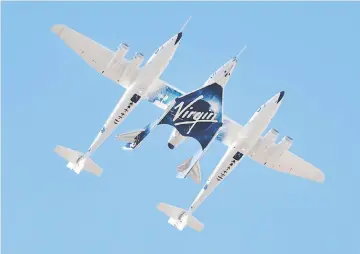  ??  ?? Virgin Galactic rocket plane, the WhiteKnigh­tTwo carrier airplane, with SpaceShipT­wo passenger craft takes off from Mojave Air and Space Port in Mojave, California. – Reuters photo