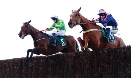  ??  ?? Le Breuil (the eventual winner, right) and Discorama takes the final fence in the NH Chase. Jerrysback finished third. Photograph: Pat Healy/ racingfoto­s.com/Rex/Shuttersto­ck