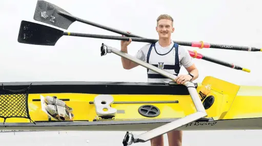  ?? PHOTO: STEPHEN JAQUIERY ?? Row, row, row your boat . . . Ben Mason with his new sea skiff, which he plans to row around the South Island in January, to raise funds for the New Zealand Breast Cancer Foundation.