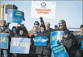  ?? LEILA NAVIDI/STAR TRIBUNE ?? Federal workers and union members rally Thursday in Minneapoli­s amid the federal shutdown, which began Dec. 22.