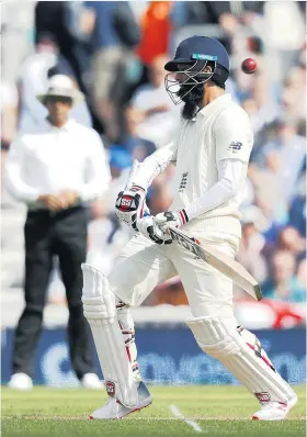  ??  ?? Dodge ball: Moeen Ali takes avoiding action during the opening day at the Oval