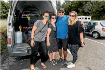  ?? SIMON O’CONNOR/STUFF ?? Oxfam trailwalke­rs Marina Healey, Katie Black, Jarrad Martin and Lynley Martin yesterday joined more than 1000 other walkers checking in for the weekend event in New Plymouth.