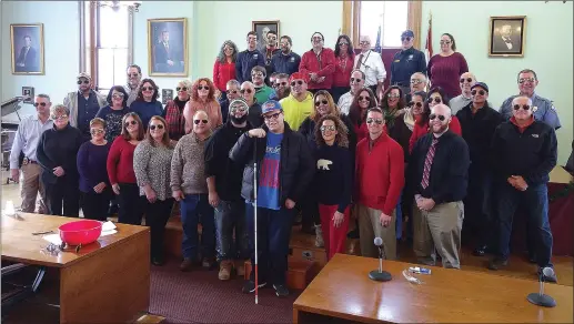  ?? Photo by Russ Olivo ?? Sixteen-year-old Jalen Rodriguez, of Woonsocket, center, joins Mayor Lisa Baldelli-Hunt and city workers and supporters during a dress down day on Friday where over $2,000 was raised to help offset the cost of Jalen’s new BrailleNot­e Touch tablet.