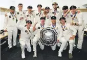  ?? PHOTOSPORT ?? Plunket Shield winners Wellington show off the spoils of their victory.