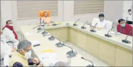  ?? SOURCED ?? Chief minister Yogi Adityanath reviewing developmen­tal works in Bareilly division .