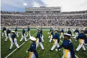  ?? AP ?? Four cadets at the Air Force Academy may not graduate or be commission­ed as military officers this month because they have refused the COVID-19 vaccine.