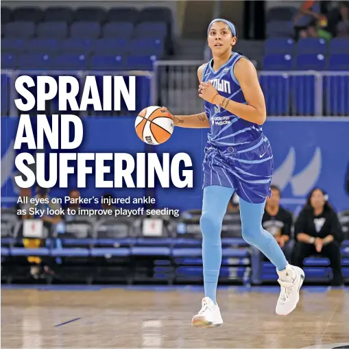  ?? KAMIL KRZACZYNSK­I/GETTY IMAGES ?? Candace Parker injured her left ankle Tuesday against the Wings. She missed eight games earlier this season because of an ankle injury.