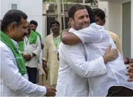  ?? — PTI ?? Congress president Rahul Gandhi being hugged by a farmer during a meeting with a delegation of farmers and farm labourers from Karnataka in New Delhi on Wednesday.