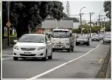  ?? DAVID UNWIN/THE POST ?? Adelaide Rd in Island Bay has no cycle lane through Wakefield Park and doesn’t leave a lot of room for cyclists, especially when cars are parked.