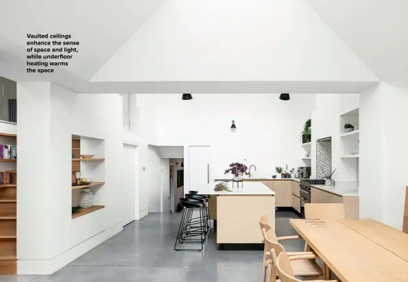  ??  ?? VAULTED CEILINGS ENHANCE THE SENSE OF SPACE AND LIGHT, WHILE UNDERFLOOR HEATING WARMS
THE SPACE