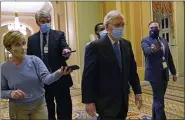  ?? SUSAN WALSH — THE ASSOCIATED PRESS ?? Senate Majority Leader Mitch McConnell of Ky., walks past reporters on Capitol Hill in Washington on Tuesday.