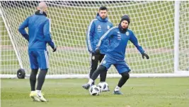  ??  ?? Lionel Messi (right) and Sergio Aguero during practice session in Manchester on Thursday