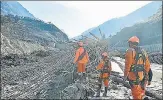  ?? PTI ?? NDRF personnel at a damaged hydel plant in Joshimath.