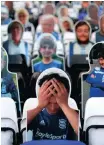  ?? CARL RECINE Reuters ?? IN England clubs resorted to placing cardboard cutouts of football fans in the stands as they tried to increase revenue and add some atmosphere into the stadiums at the beginning of the Covid-19 pandemic. |