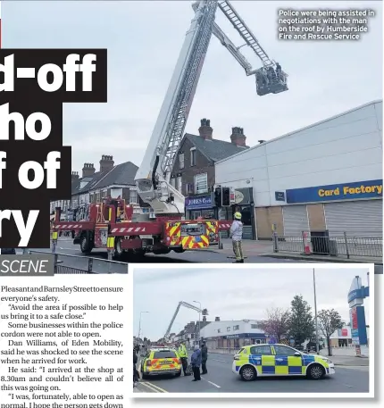  ??  ?? Police were being assisted in negotiatio­ns with the man on the roof by Humberside Fire and Rescue Service