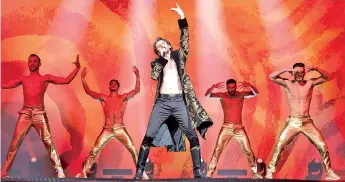  ?? — John Wilson/Netflix ?? Dan Stevens, center, in ‘Eurovision Song Contest: The Story of Fire Saga.’