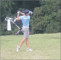  ?? STAFF PHOTO BY TED BLACK ?? La Plata High School junior Gavin Ganter fires a tee shot on No. 8 at Hawthorne Country Club in La Plata on Tuesday. Ganter finished the round with a 41 as the Warriors defeated Northern and Lackey to capture the Southern Maryland Athletic Conference tri-match.