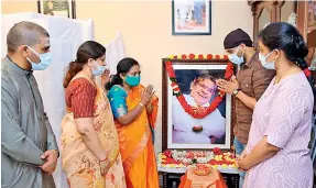  ?? —BY ARRANGEMEN­T ?? Telangana state Governor Dr Tamilisai Soundarara­jan (third from left) calls on the family members of late lyricist Sirivennel­a Seetharama Sastry to express her condolence­s at his residence on Tuesday.