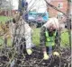  ??  ?? Rotarians planted trees at Sebastian’s Action Trust for Earth Day