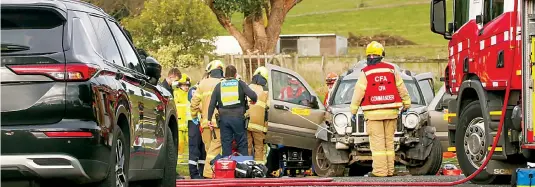  ?? ?? Emergency services, including CFA, police, SES and paramedics attend the scene of the multi-vehicle collision yesterday morning.