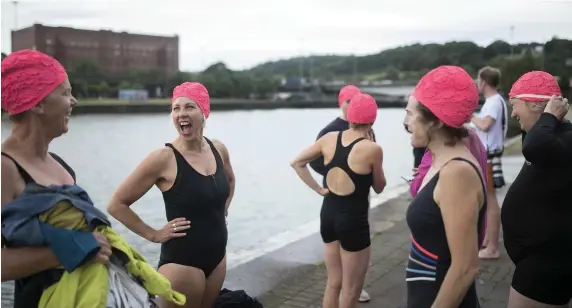  ?? Pics: James Beck ?? Swimmers who gathered at Cumberland Basin on Friday urging the council to lift the ban on swimming in parts of the harbour