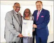  ??  ?? The Rev. Julius Collins with his wife, Vernice, and state Sen. John Bonacic.