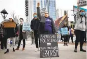  ?? ALEX SLITZ AP ?? Demonstrat­ors call for justice Saturday during a protest in Atlanta, one of several held across the U.S.