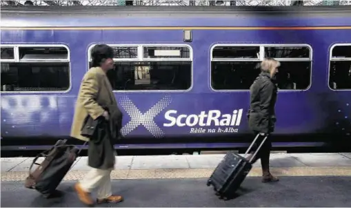  ??  ?? PROTECTION: After a 2015 trial, the body-worn camera technology is being rolled out to all rail staff in Scotland