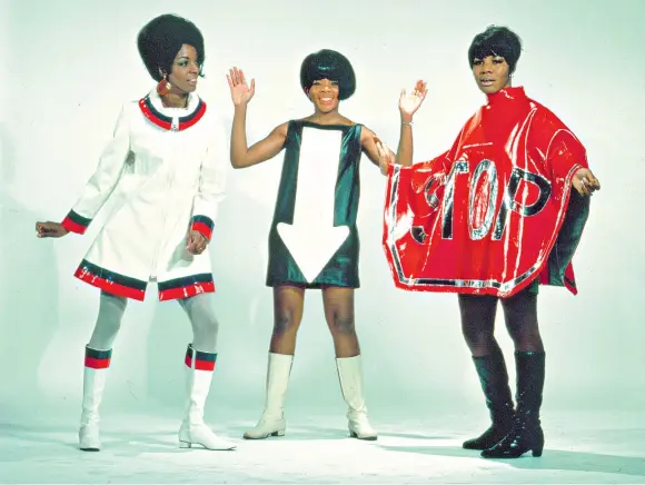  ??  ?? Sign language: Martha Reeves, far left, with the Vandellas in the Sixties