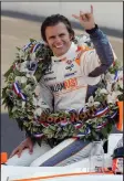  ?? (AP file photo) ?? IndyCar driver Dan Wheldon signals his second Indianapol­is 500 victory in 2011. Wheldon is the subject of a new HBO documentar­y “The Lionheart.”