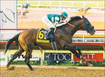  ?? Benoit Photo ?? HIGHER POWER, with Flavien Prat aboard, wins the Grade I $1-million Pacific Classic at Del Mar Saturday.