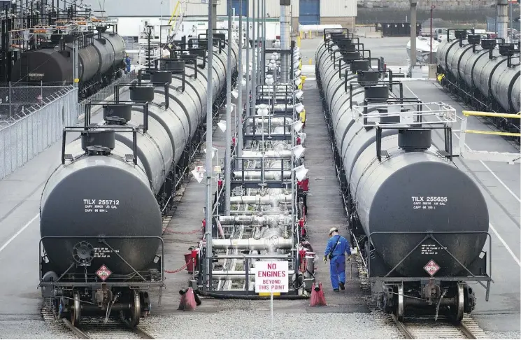  ?? PETER J. THOMPSON ?? Irving Oil Ltd.’s loading area in Saint John, N.B. Irving Oil and Plains All American Pipeline LP are said to be offering Canadian crude to U.S. buyers by rail for January and February loading. Renewed interest in railing heavy Canadian oil began about...