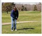  ??  ?? Dave Bernas tees off Wednesday at Reid
Park in Springfiel­d before golf courses were ruled nonessenti­al.