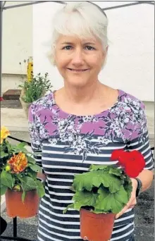  ?? COURTESY JUDITH TAYLOR ?? Judith Taylor is pictured at a recent gardening show and is excited to be sharing her love of gardening via Zoom with ‘Adventures in Seed Starting’ on several upcoming dates across the region.