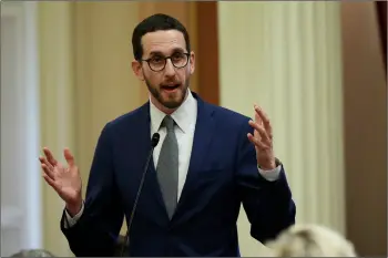  ?? AP PHOTO/RICH PEdRONCELL­I ?? In this 2018 file photo, State Sen. Scott Wiener, D-San Francisco, speaks to members of the Senate in Sacramento, Calif.