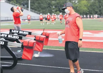  ?? TIM PHILLIS — THE NEWS-HERALD ?? Online: Find photos from area high school teams’ first practices at NEWS-HERALD.COM/ SPORTS