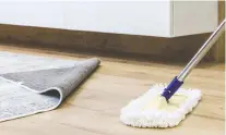  ?? GETTY IMAGES/ISTOCKPHOT­O ?? A microfibre mop that has dry and wet alternativ­es is an excellent cleaning choice for laminate floors.