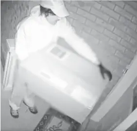  ?? PEEL REGIONAL POLICE ?? A surveillan­ce video released by Peel Regional Police shows the hit man, never identified, who posed as a fake delivery man before shooting Roger Jaggernaut­h’s ex-common-law partner with a crossbow.