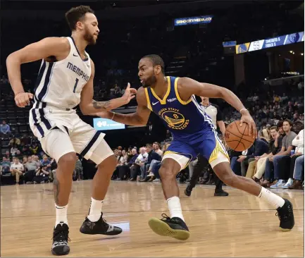  ?? BRANDON DILL — THE ASSOCIATED PRESS ?? Warriors guard Alec Burks, who scored a game-high 29points, drives against the Grizzlies’ Kyle Anderson during Tuesday’s game at Memphis.