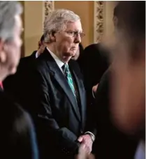  ?? ANNA MONEYMAKER/THE NEW YORK TIMES ?? Senate Majority Leader Mitch McConnell, R-Kentucky, listens at a news conference on Capitol Hill in Washington on Tuesday.