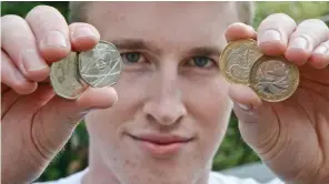  ??  ?? Penny-wise: James Grear with a selection of collectabl­e coins